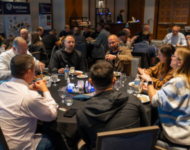 CriticalArc Customers gathered around a table during the gala dinner