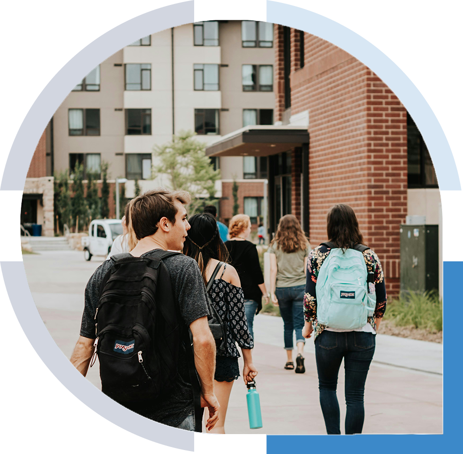 students with backpacks walking
